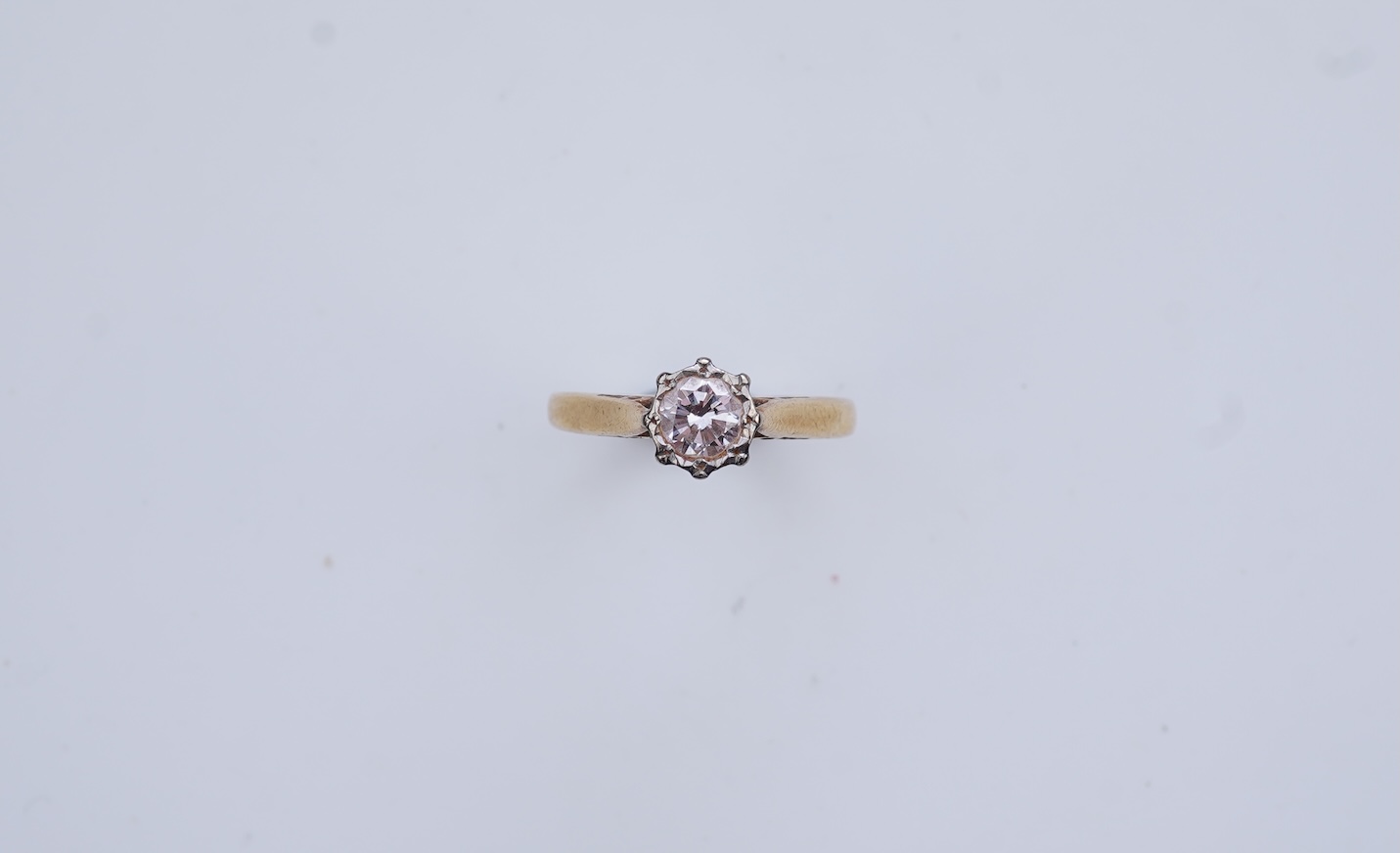 A diamond solitaire ring